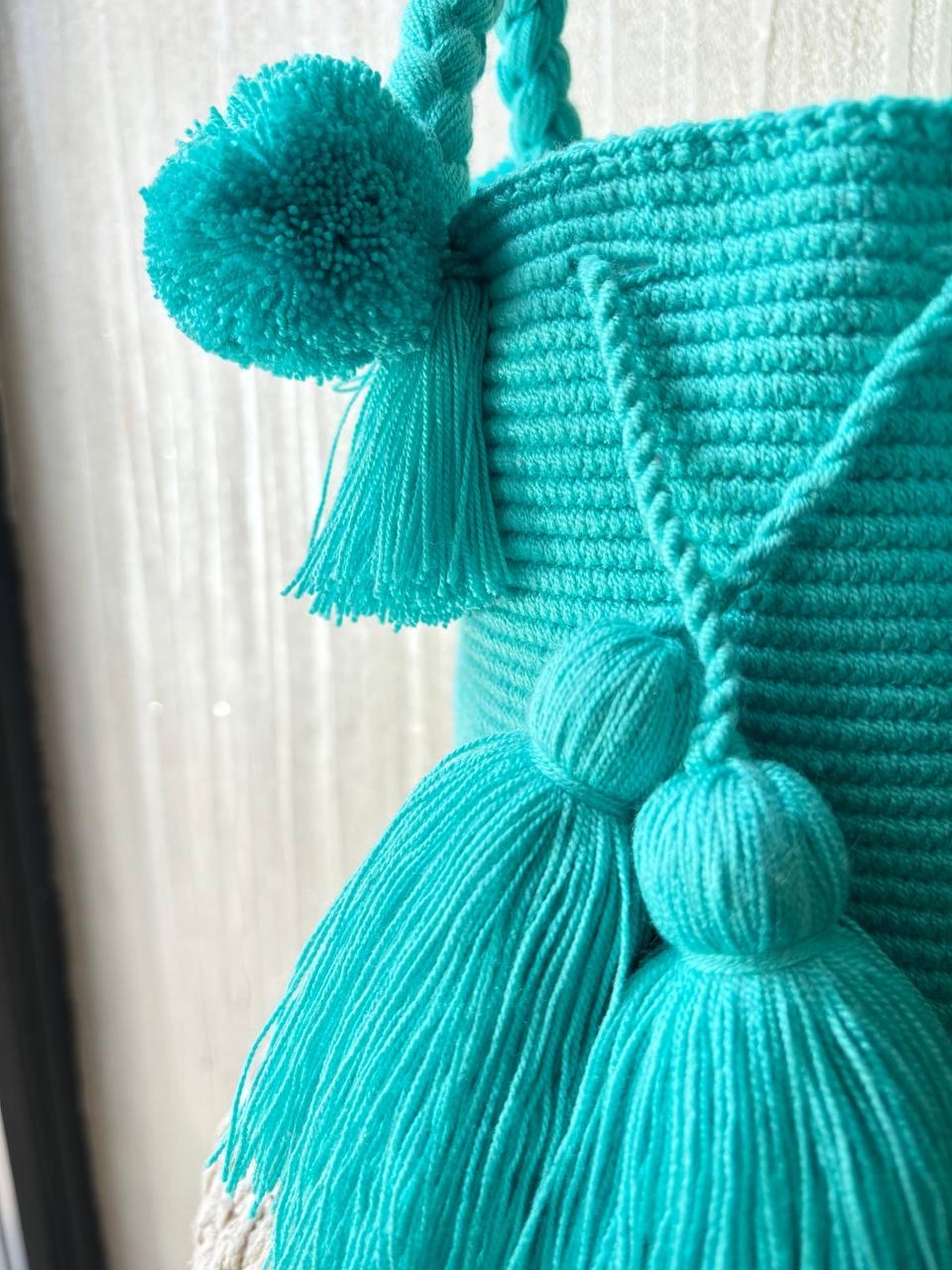 MOCHILA POMPONES S
