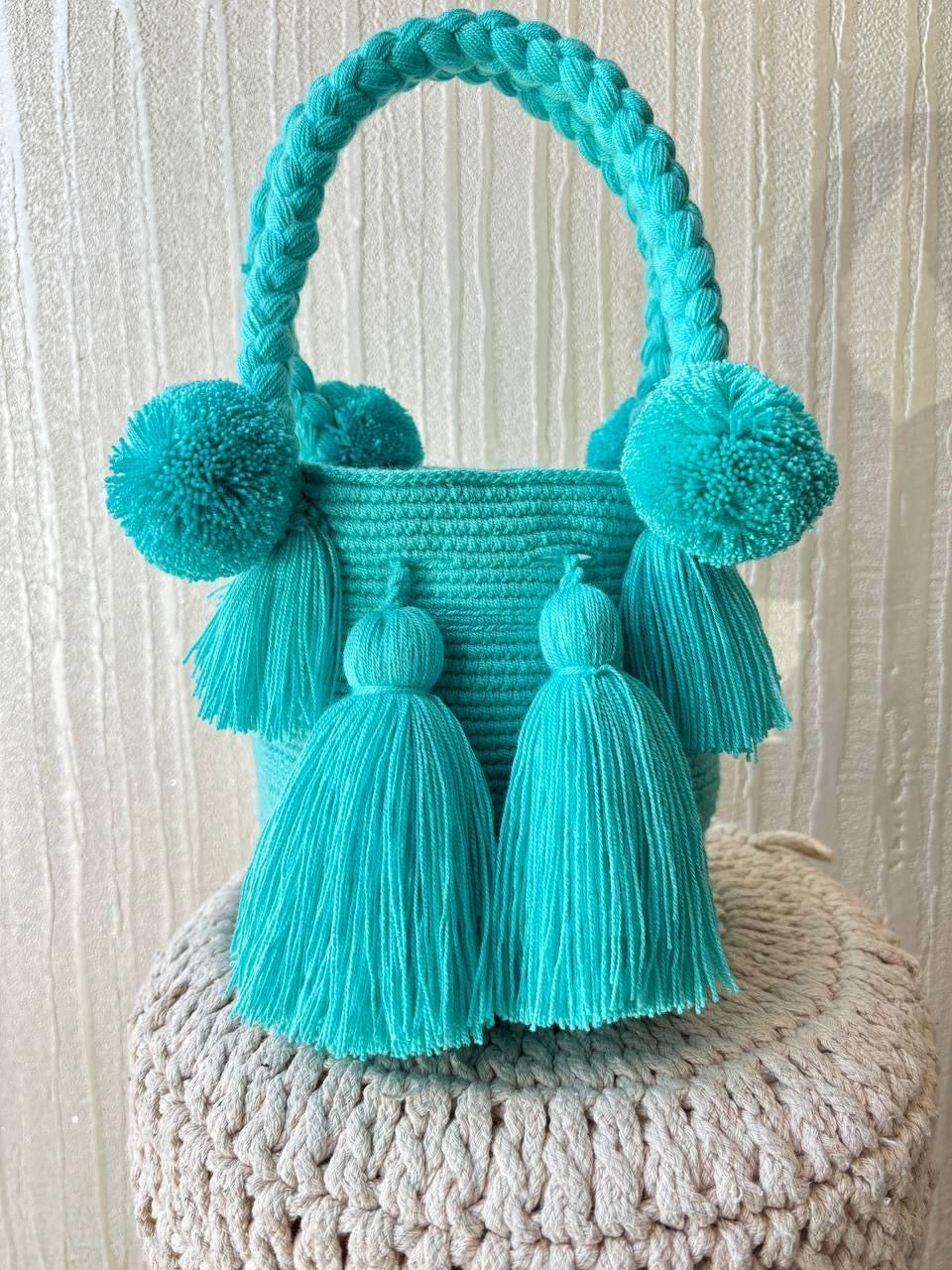 MOCHILA POMPONES S
